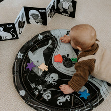 Load image into Gallery viewer, baby water mat, high contrast toy, black and white toy, black and white water mat, high contrast water mat, black and white baby toys, Young Wonderer, tummy time toy, black and white tummy time toy, young wonderer, young wonderer baby boutique, baby boutique australia, baby gifts australia, baby gift ideas, baby gift, tummy time play, tummy time toys, black and white baby toys australia