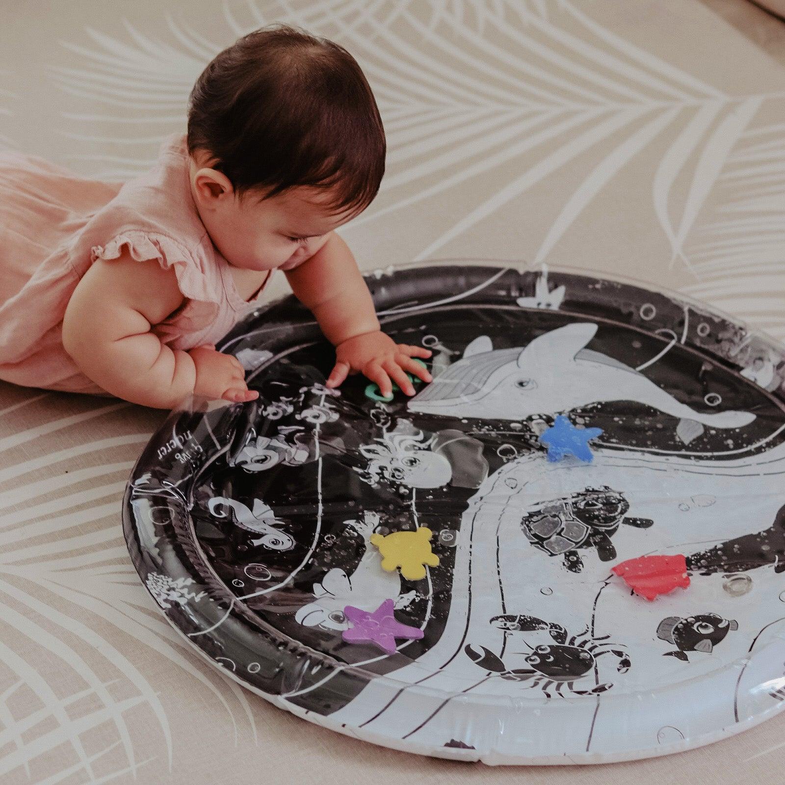 baby water mat, high contrast toy, black and white toy, black and white water mat, high contrast water mat, black and white baby toys, Young Wonderer, tummy time toy, black and white tummy time toy, young wonderer, young wonderer baby boutique, baby boutique australia, baby gifts australia, baby gift ideas, baby gift, tummy time play, tummy time toys, black and white baby toys australia