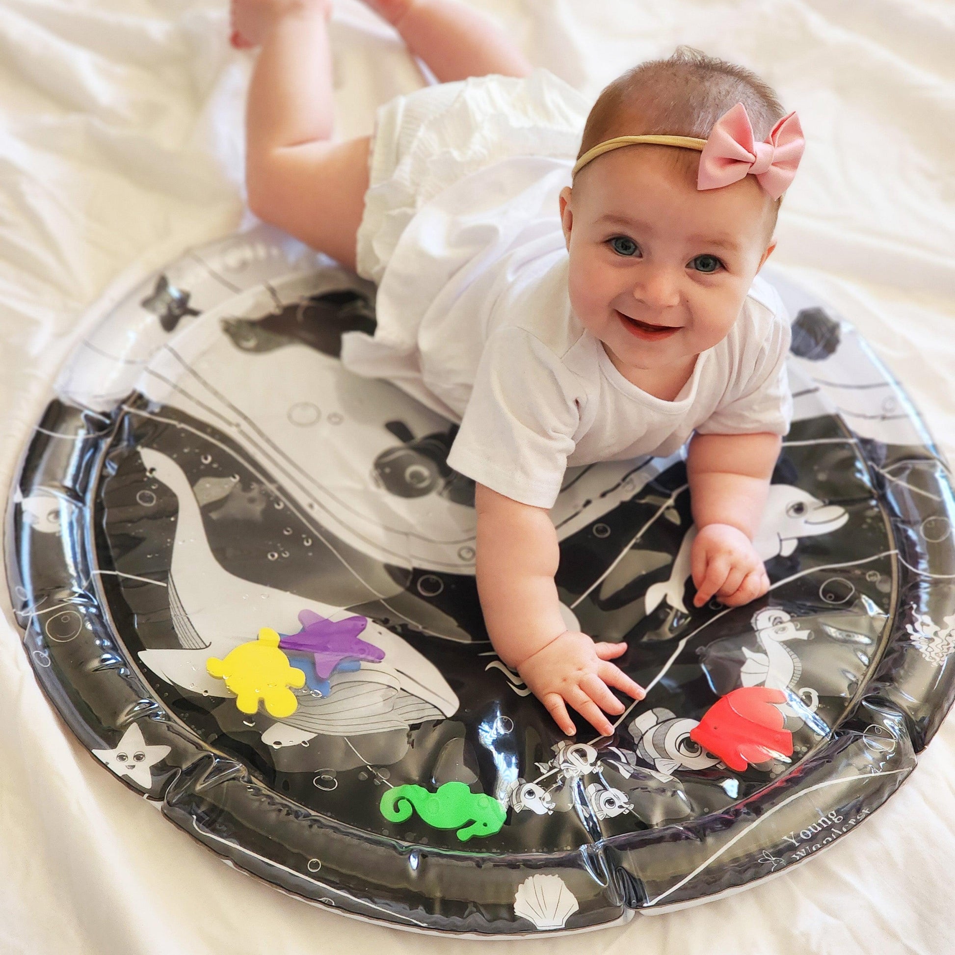 baby water mat, high contrast toy, black and white toy, black and white water mat, high contrast water mat, black and white baby toys, Young Wonderer, tummy time toy, black and white tummy time toy, young wonderer, young wonderer baby boutique, baby boutique australia, baby gifts australia, baby gift ideas, baby gift, tummy time play, tummy time toys, black and white baby toys australia